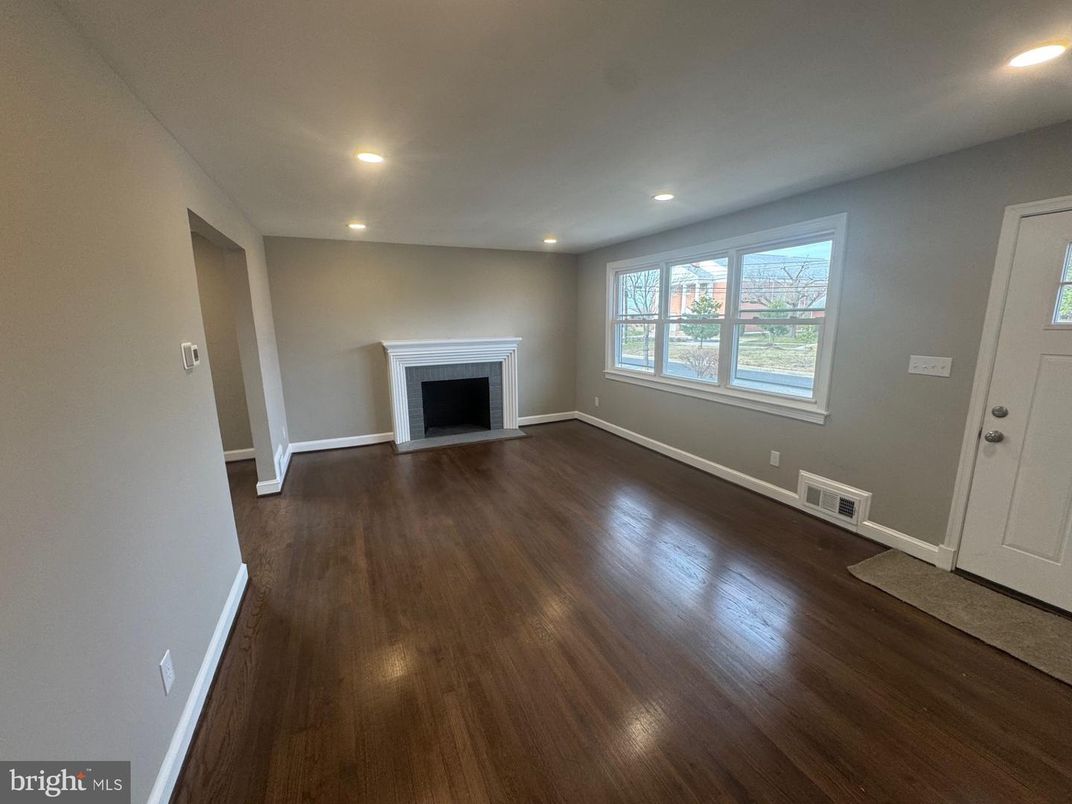 Empty room, Fireplace, Interior, Recessed Lighting, Wood Texture Flooring