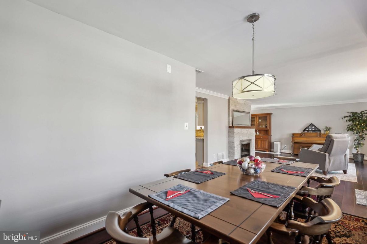 Dining room, Fireplace, Interior, Pendant Lights, Wood Texture Flooring