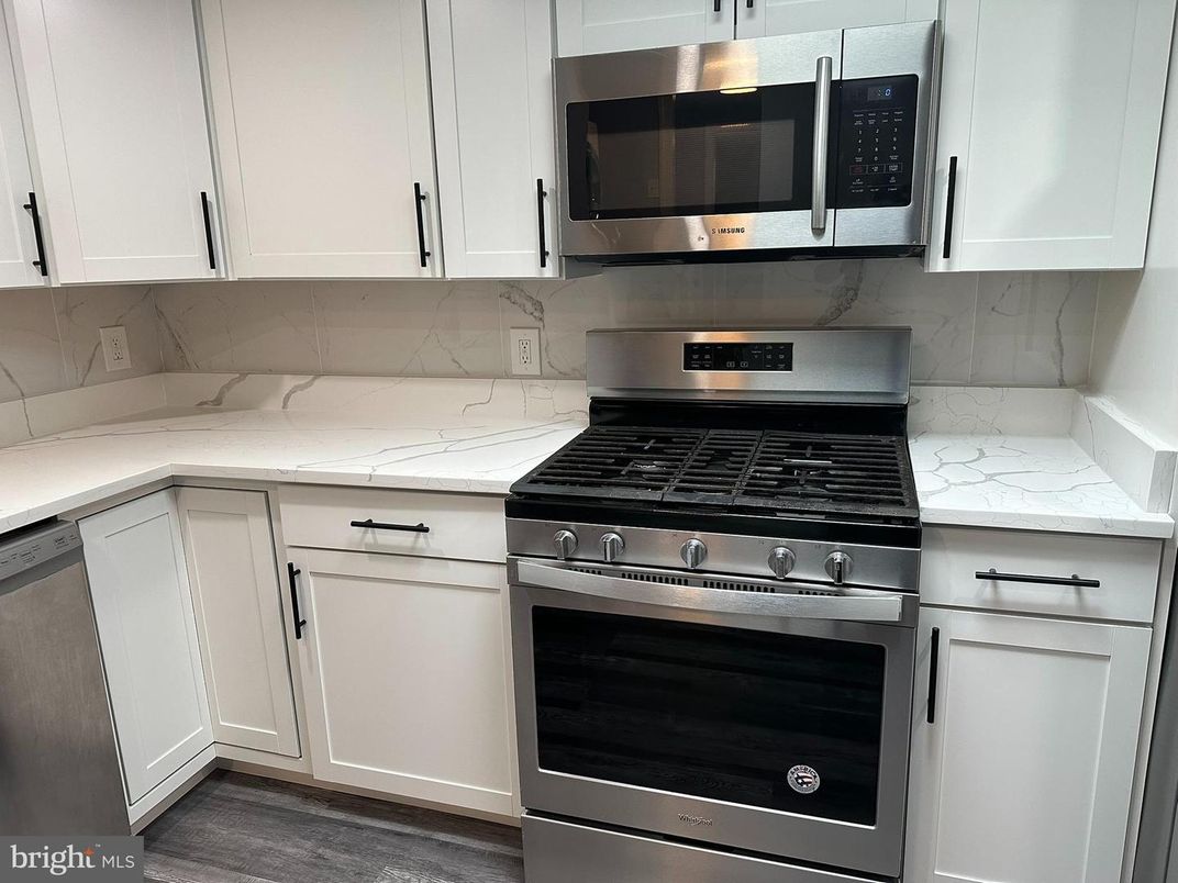 Interior, Kitchen, Marble Walls, Stainless Steel Appliances, Wood Texture Flooring