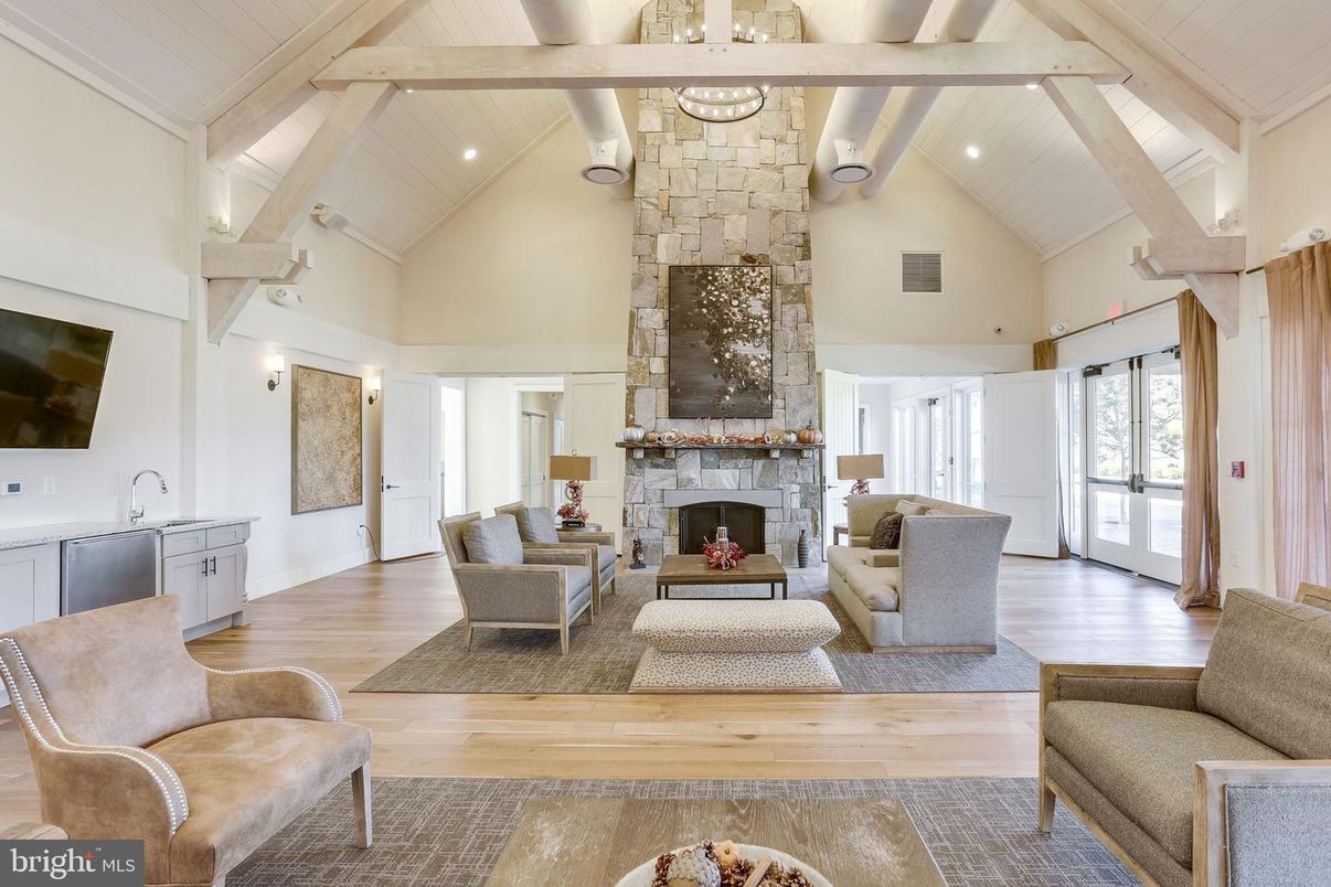 Fireplace, Interior, Living room, Recessed Lighting, Stone Walls, Wood Texture Flooring