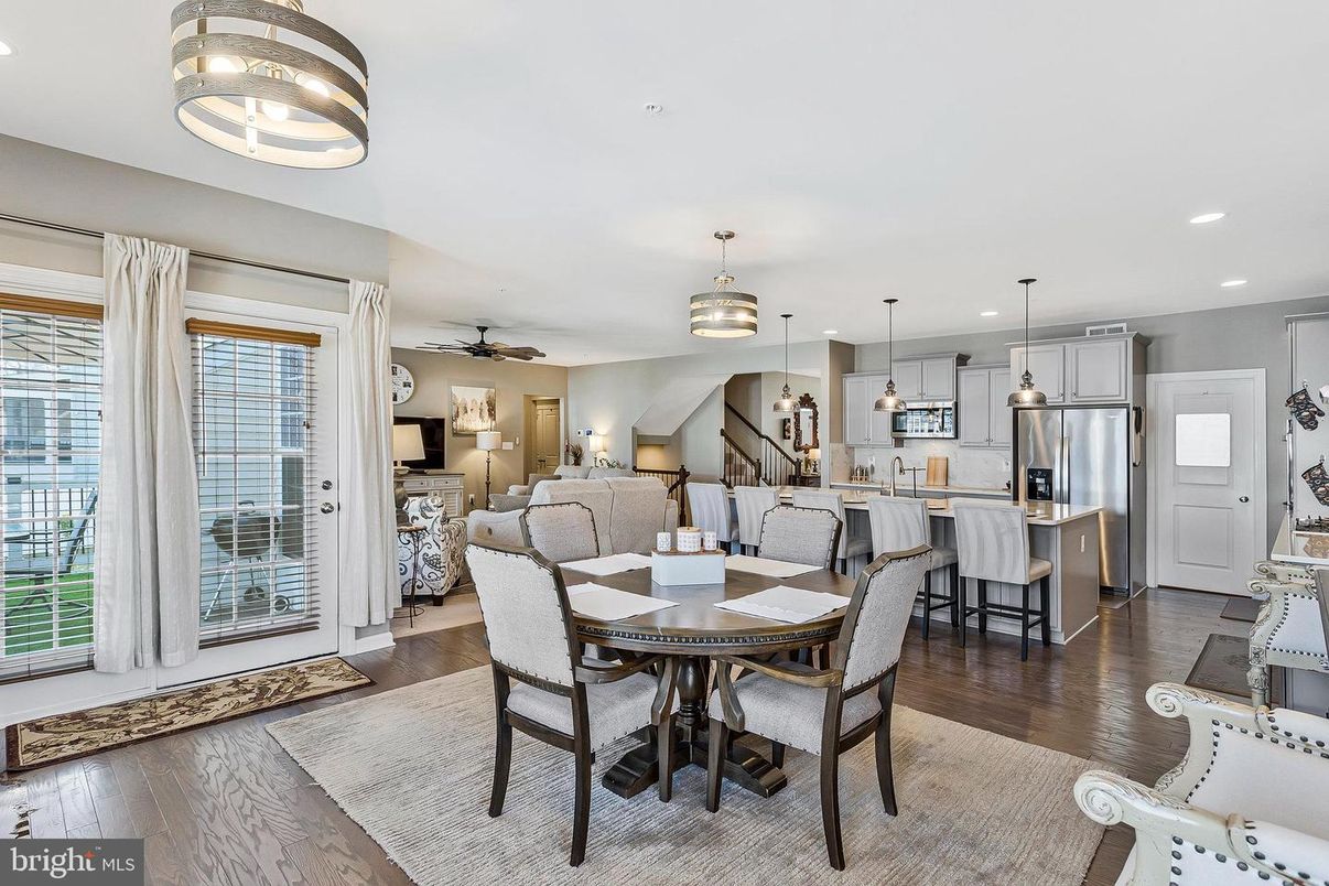 Dining room, Interior, Kitchen, Pendant Lights, Recessed Lighting, Stainless Steel Appliances, Wood Texture Flooring
