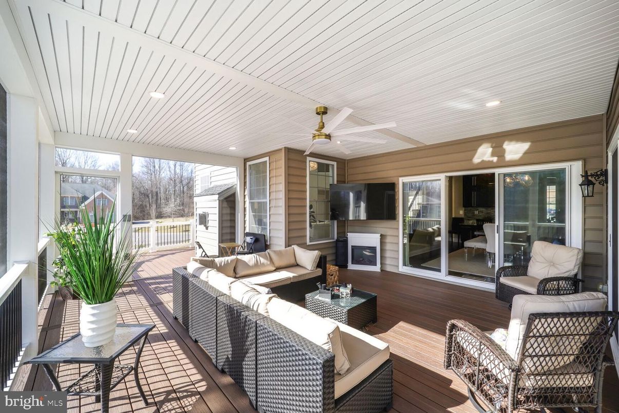 Exterior, Fireplace, Recessed Lighting, Wood Texture Flooring