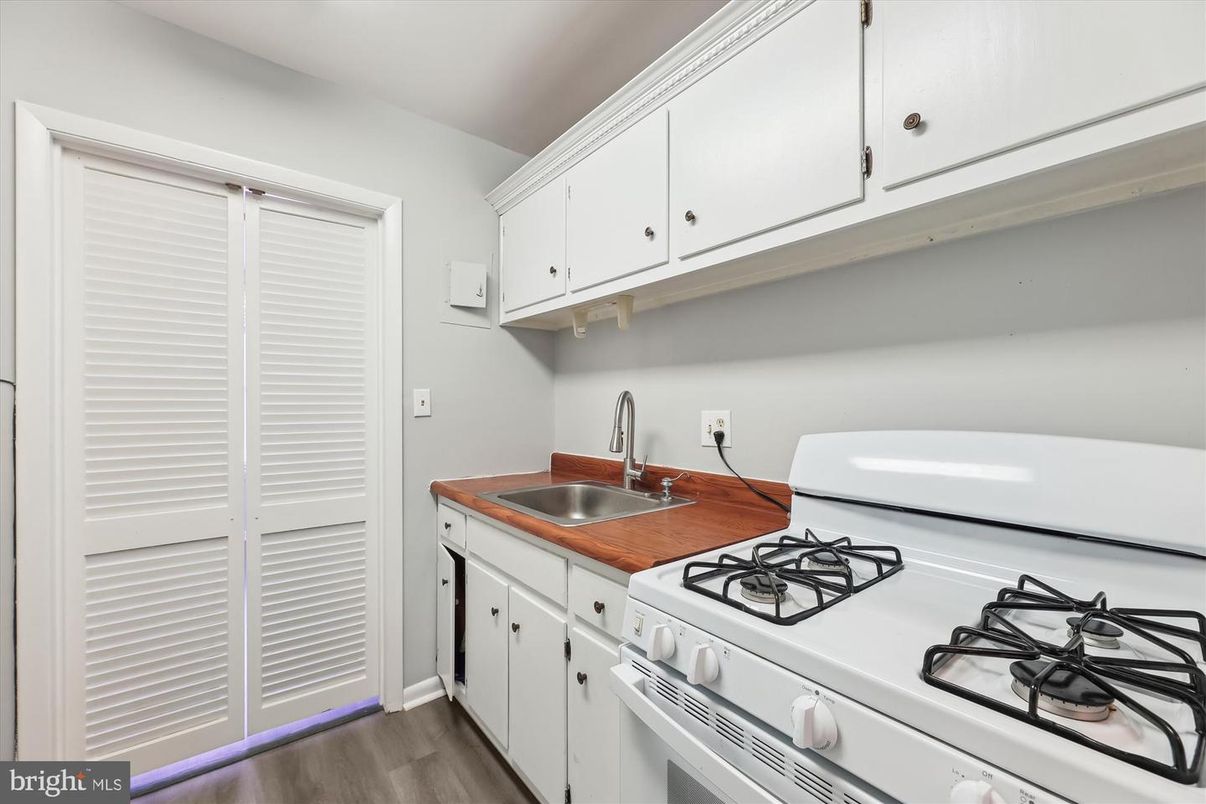 Interior, Kitchen, Tile Countertops, Wood Texture Flooring