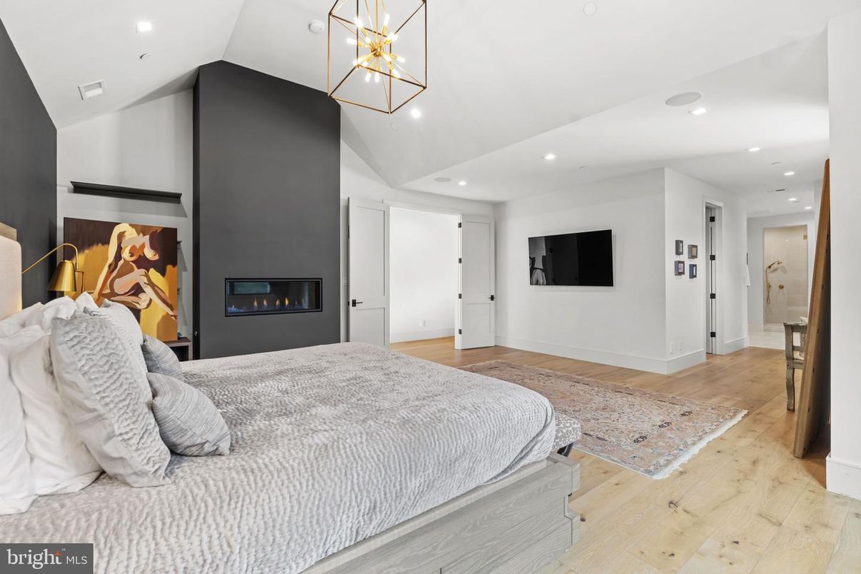 Bedroom, Fireplace, Interior, Pendant Lights, Recessed Lighting, Wood Texture Flooring