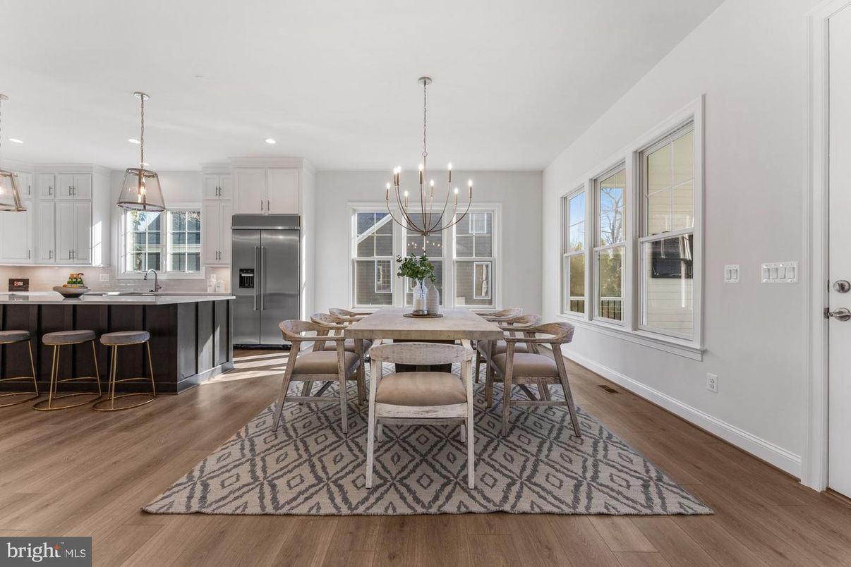 Chandelier, Dining room, Interior, Kitchen, Pendant Lights, Recessed Lighting, Stainless Steel Appliances, Wood Texture Flooring