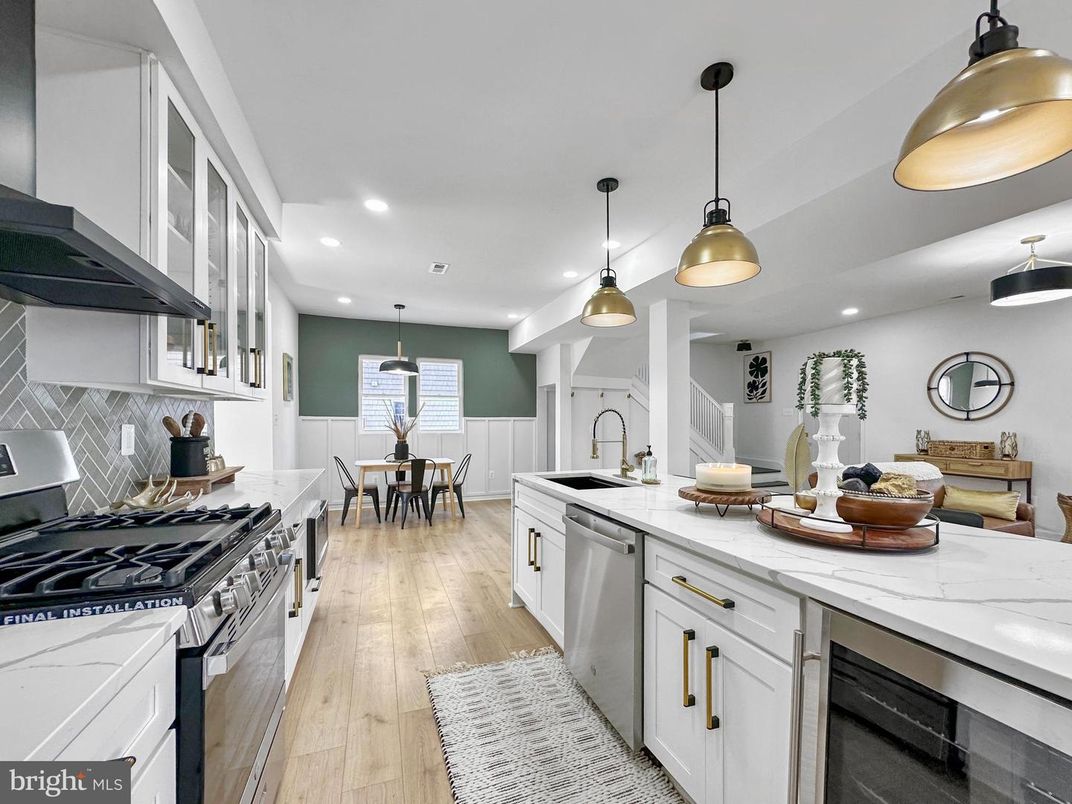 Dining room, Interior, Kitchen, Pendant Lights, Recessed Lighting, Stainless Steel Appliances, Wood Texture Flooring