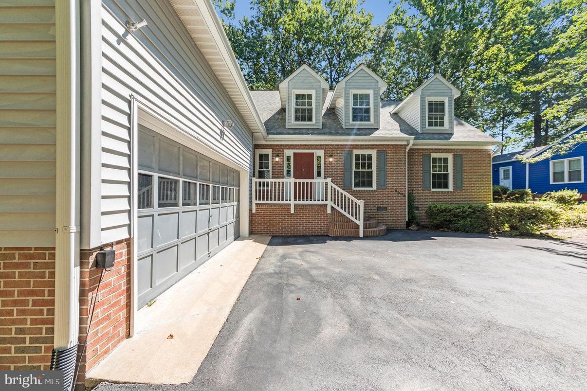 Exterior, Facade, Brick Facade, Cape Cod