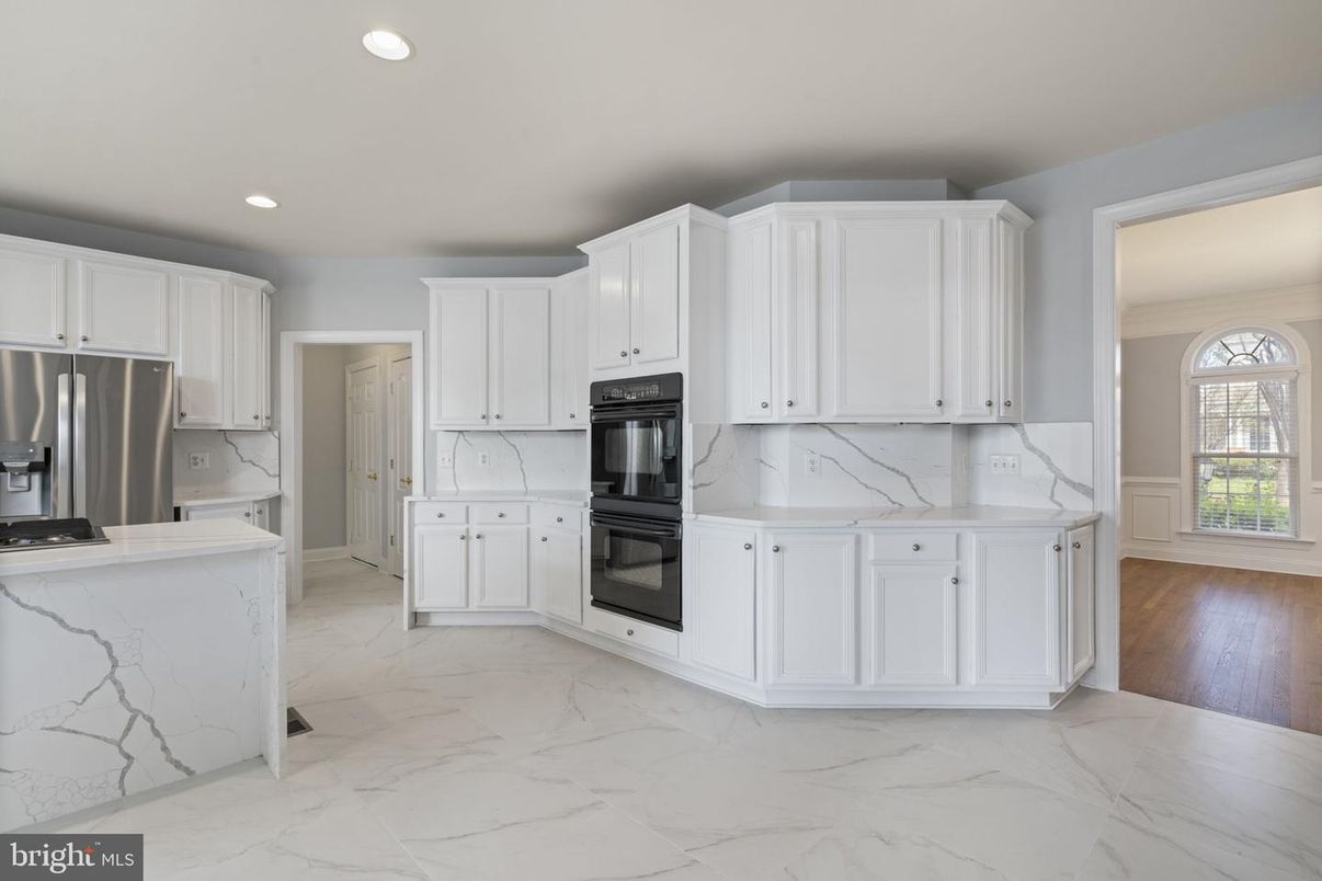 Interior, Kitchen, Marble, Marble Walls, Recessed Lighting, Stainless Steel Appliances