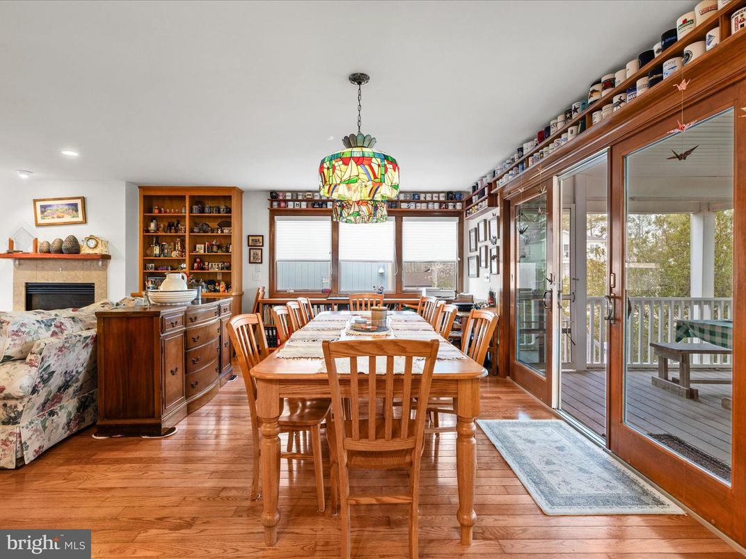 Dining room, Fireplace, Interior, Pendant Lights, Recessed Lighting, Wood Texture Flooring