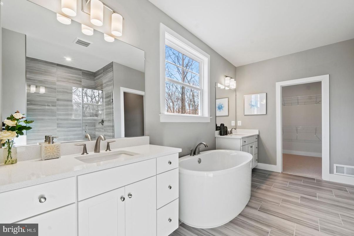 Bathroom, Dual Sink Vanities, Free Standing Baths, Glass Shower, Interior, Wood Texture Flooring