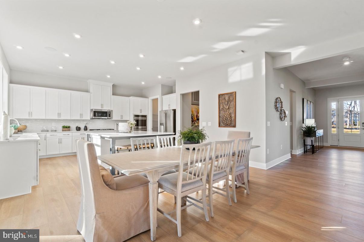 Dining room, Interior, Kitchen, Recessed Lighting, Stainless Steel Appliances, Wood Texture Flooring