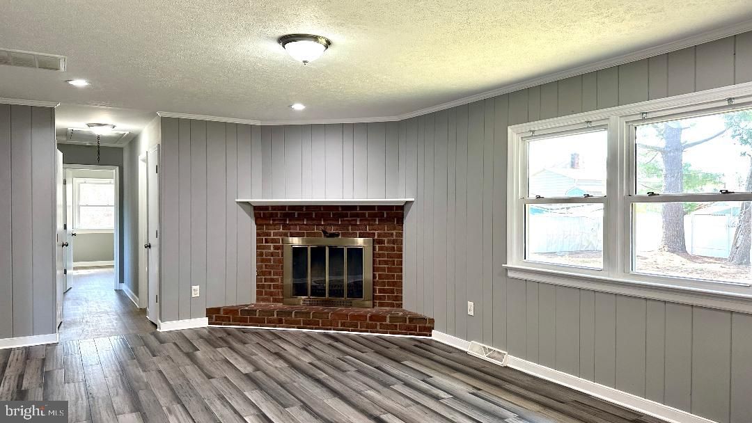 Fireplace, Interior, Recessed Lighting, Stone Walls, Wood Texture Flooring