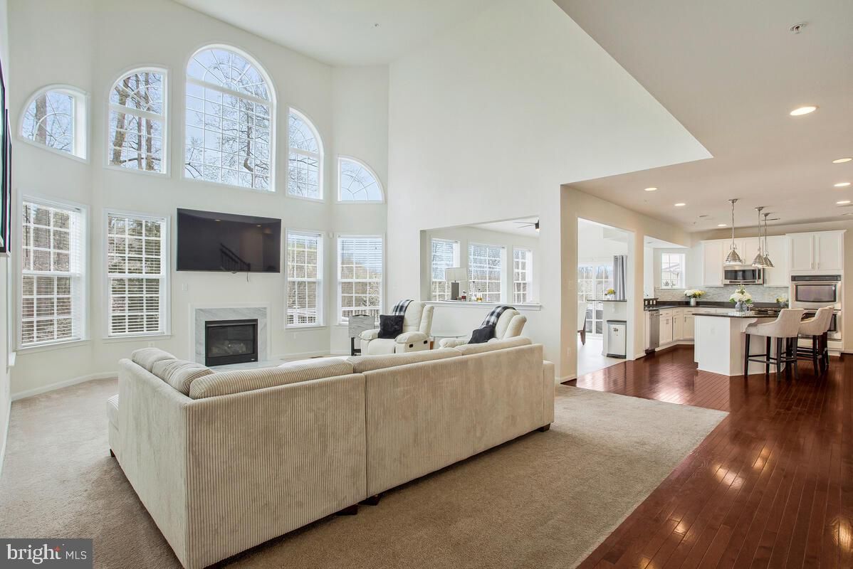 Dining room, Fireplace, Interior, Kitchen, Living room, Pendant Lights, Recessed Lighting, Wood Texture Flooring