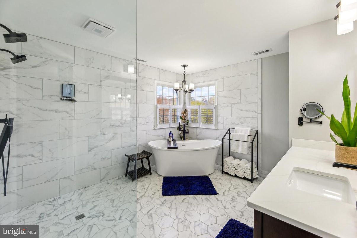 Bathroom, Dual Sink Vanities, Free Standing Baths, Glass Shower, Interior, Marble, Marble Walls, Pendant Lights