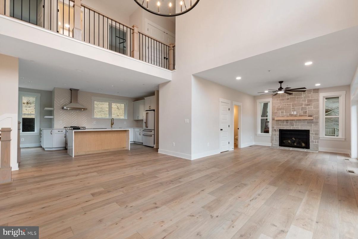 Fireplace, Interior, Kitchen, Recessed Lighting, Stone Walls, Wood Texture Flooring