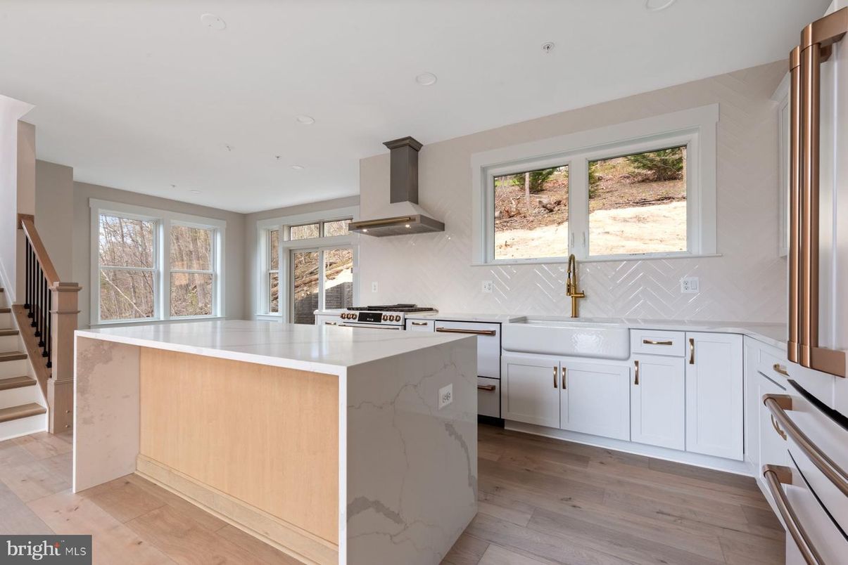 Interior, Kitchen, Marble Walls, Recessed Lighting, Stainless Steel Appliances, Wood Texture Flooring