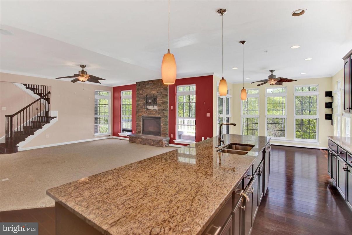 Fireplace, Interior, Kitchen, Pendant Lights, Recessed Lighting, Stone Walls, Wood Texture Flooring