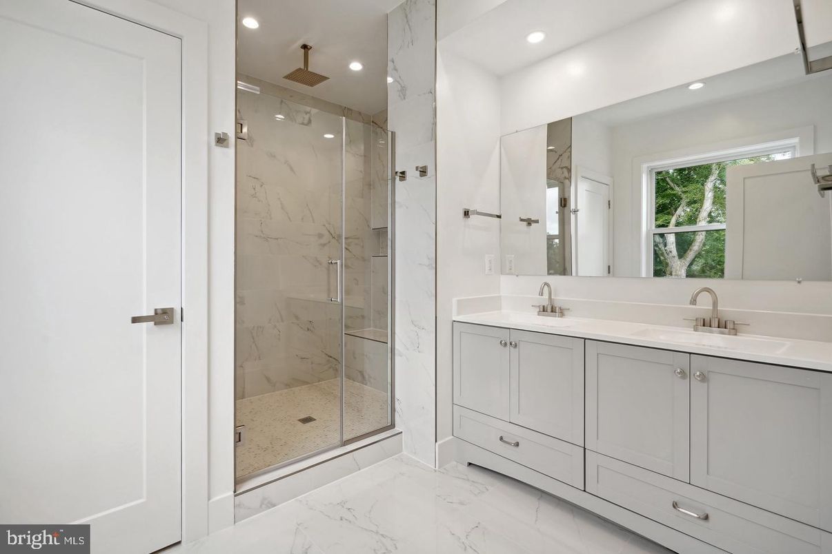 Bathroom, Dual Sink Vanities, Glass Shower, Interior, Marble, Marble Walls, Recessed Lighting