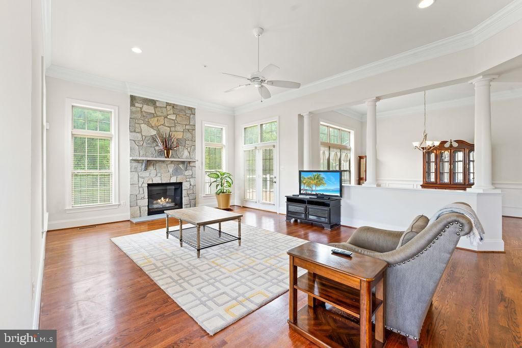 Fireplace, Interior, Living room, Pendant Lights, Recessed Lighting, Stone Walls, Wood Texture Flooring