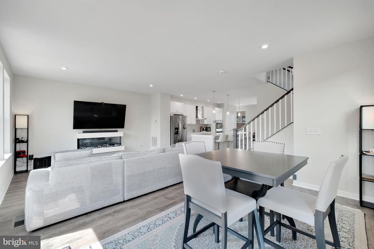 Dining room, Interior, Kitchen, Living room, Pendant Lights, Recessed Lighting, Stainless Steel Appliances, Wood Texture Flooring