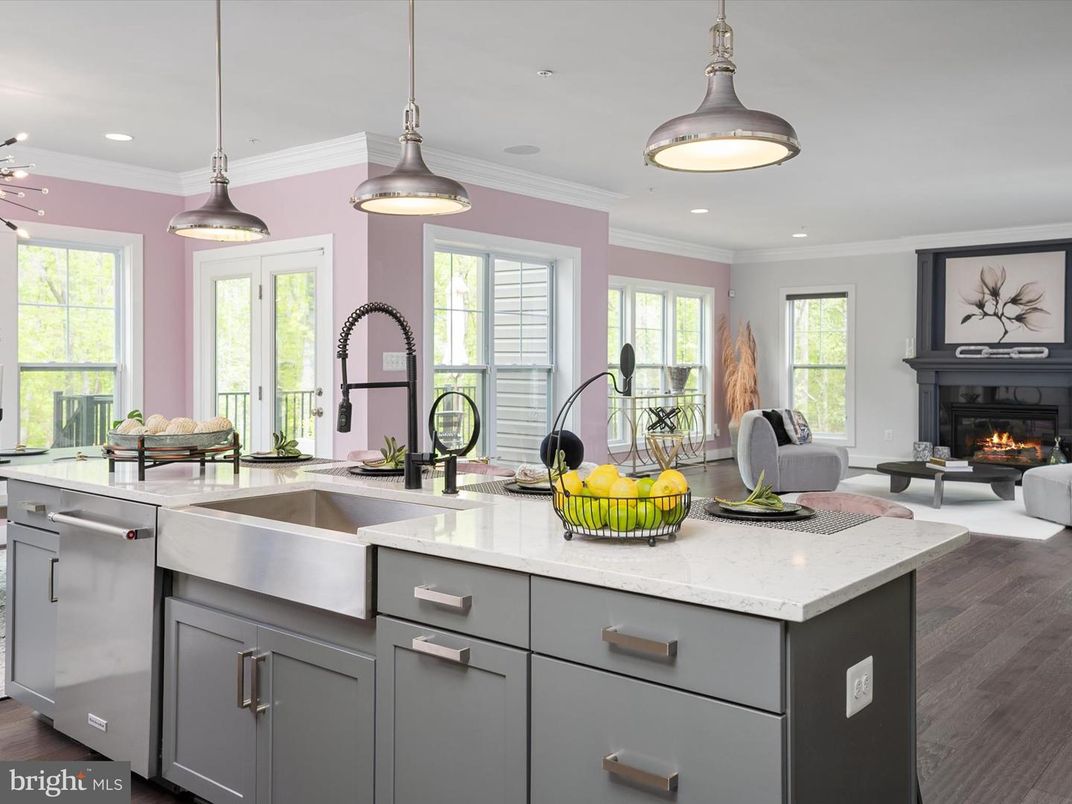 Fireplace, Interior, Kitchen, Living room, Pendant Lights, Recessed Lighting, Stainless Steel Appliances, Wood Texture Flooring