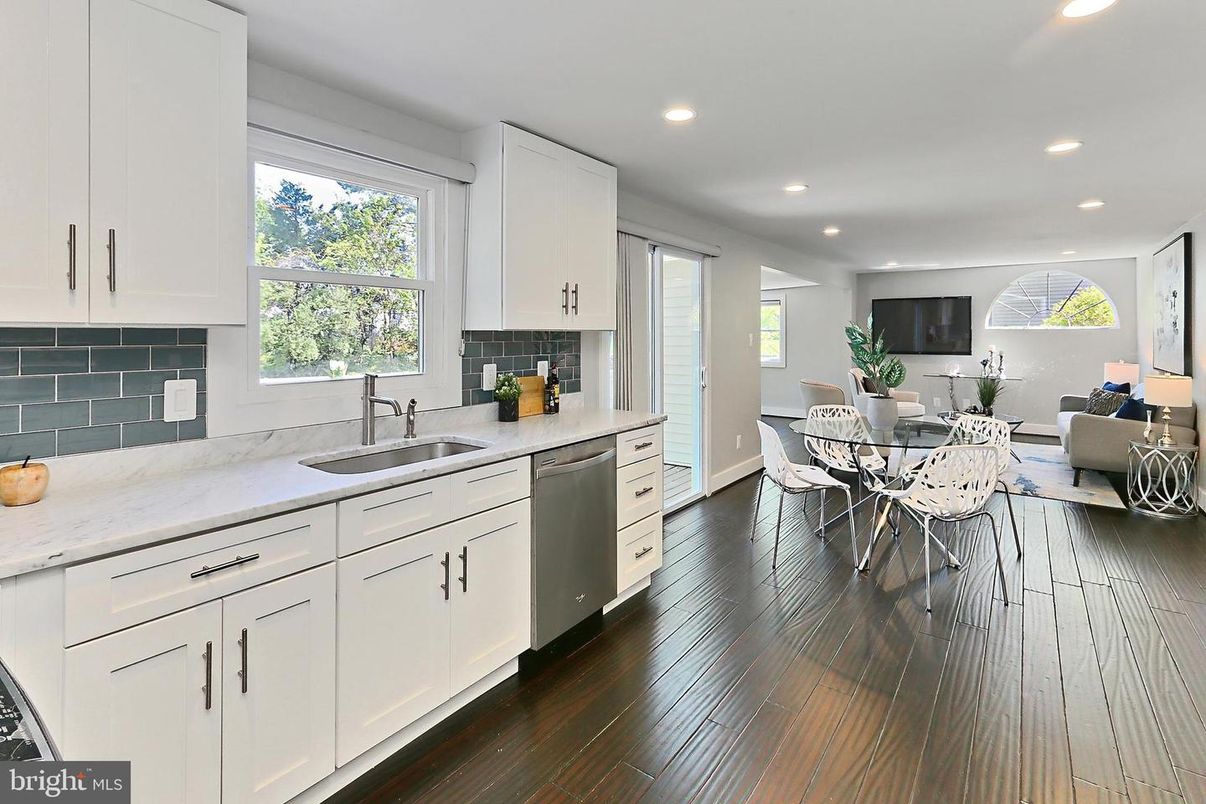 Dining room, Interior, Kitchen, Living room, Recessed Lighting, Stainless Steel Appliances, Wood Texture Flooring