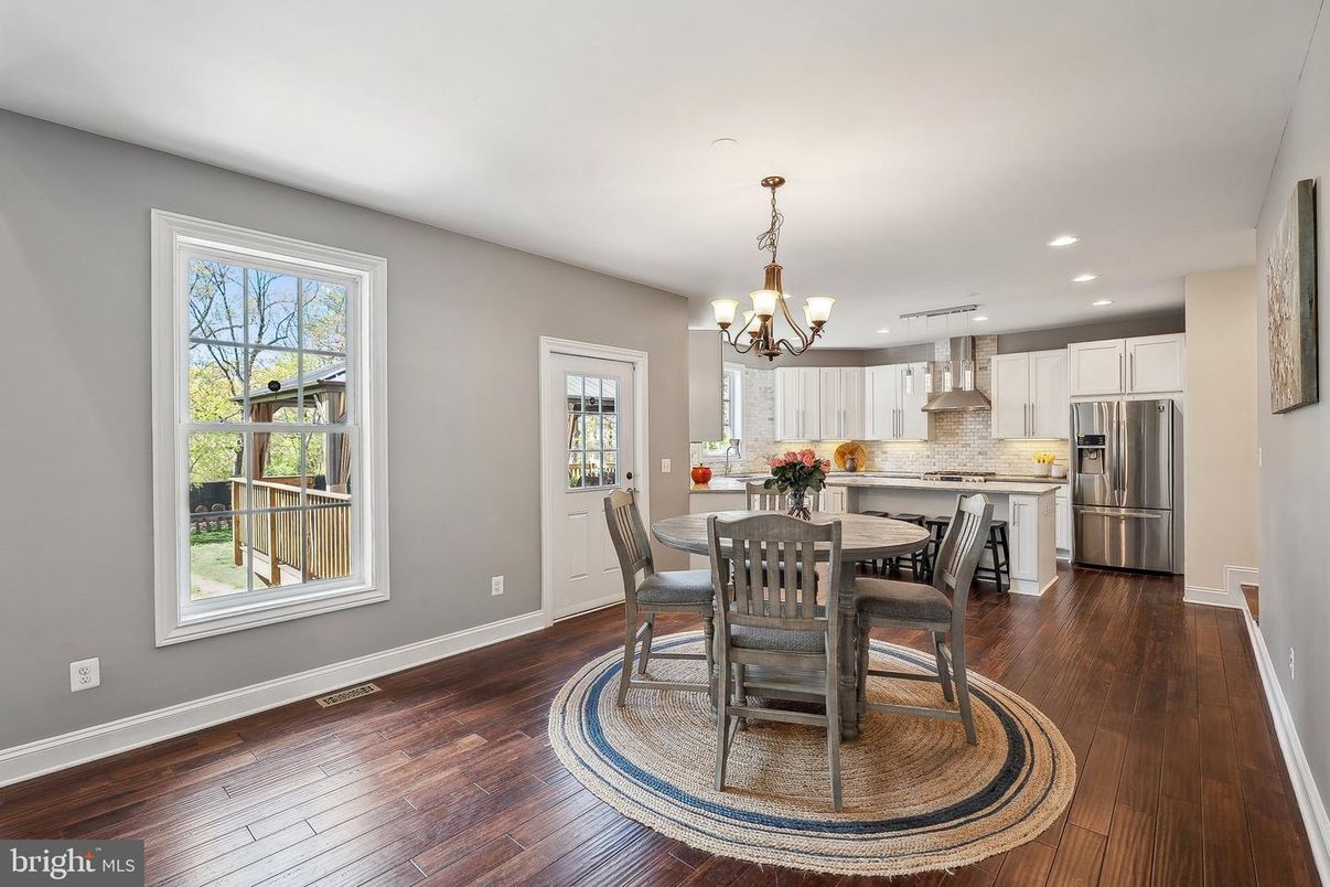 Chandelier, Dining room, Interior, Kitchen, Recessed Lighting, Stainless Steel Appliances, Wood Texture Flooring