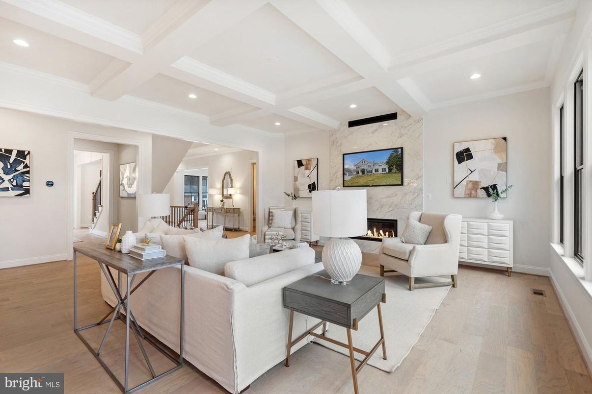 Fireplace, Interior, Living room, Marble Walls, Recessed Lighting, Wood Texture Flooring