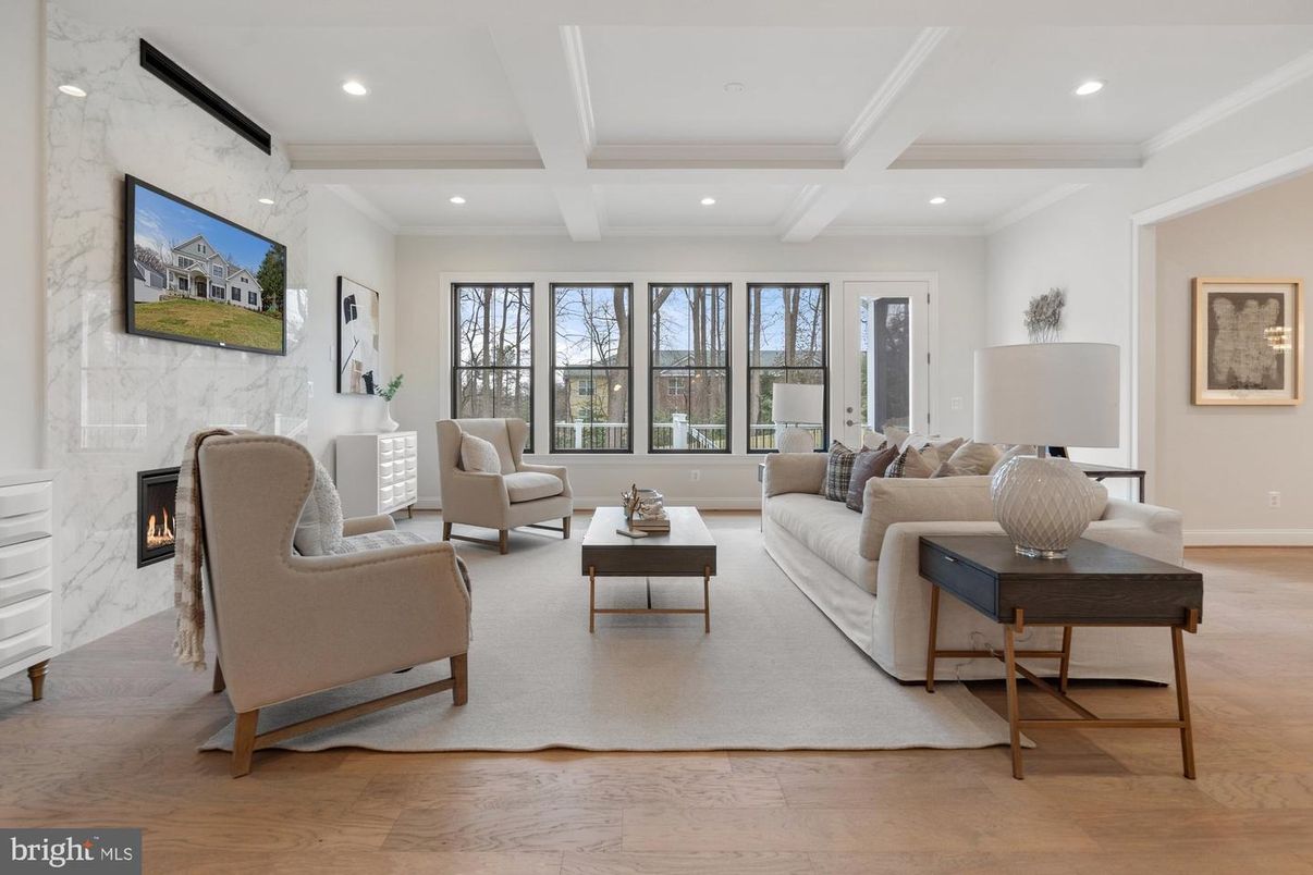 Fireplace, Interior, Living room, Marble Walls, Recessed Lighting, Wood Texture Flooring