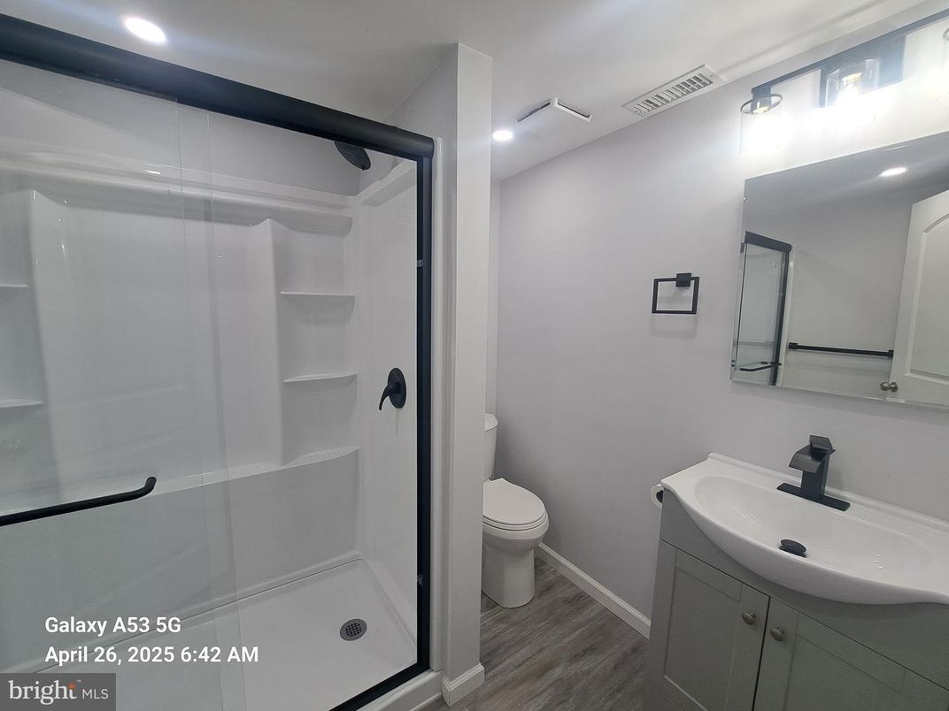 Bathroom, Glass Shower, Interior, Recessed Lighting, Wood Texture Flooring