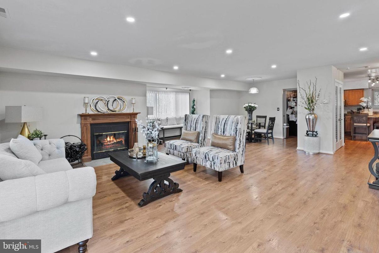 Dining room, Fireplace, Interior, Living room, Pendant Lights, Recessed Lighting, Wood Texture Flooring