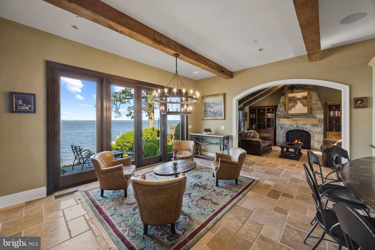 Chandelier, Fireplace, Interior, Living room, Pendant Lights, Recessed Lighting, Water, Wooden Beams