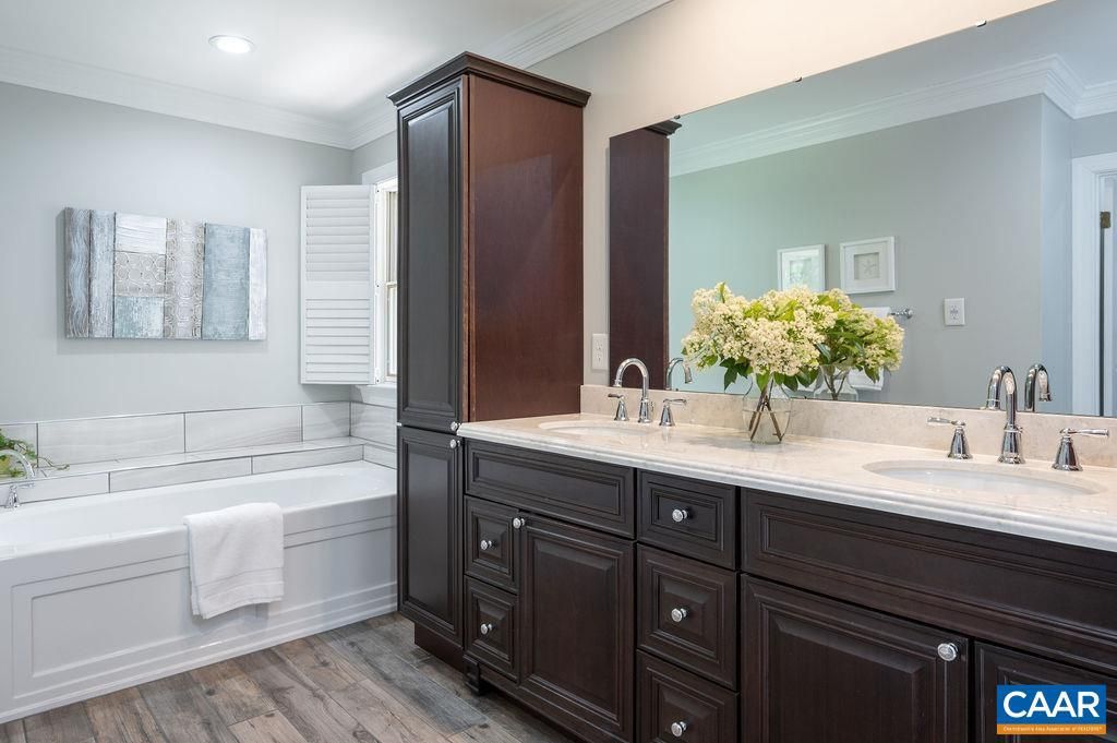 Bathroom, Dual Sink Vanities, Interior, Recessed Lighting, Wood Texture Flooring