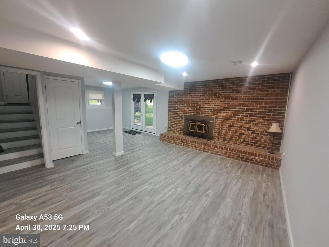 Fireplace, Interior, Recessed Lighting, Stone Walls, Wood Texture Flooring