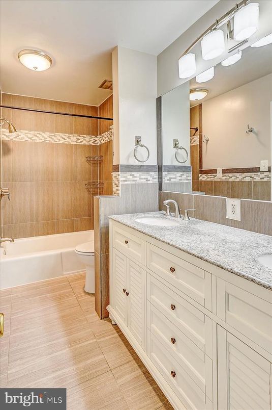 Bathroom, Dual Sink Vanities, Interior, Recessed Lighting, Wood Texture Flooring