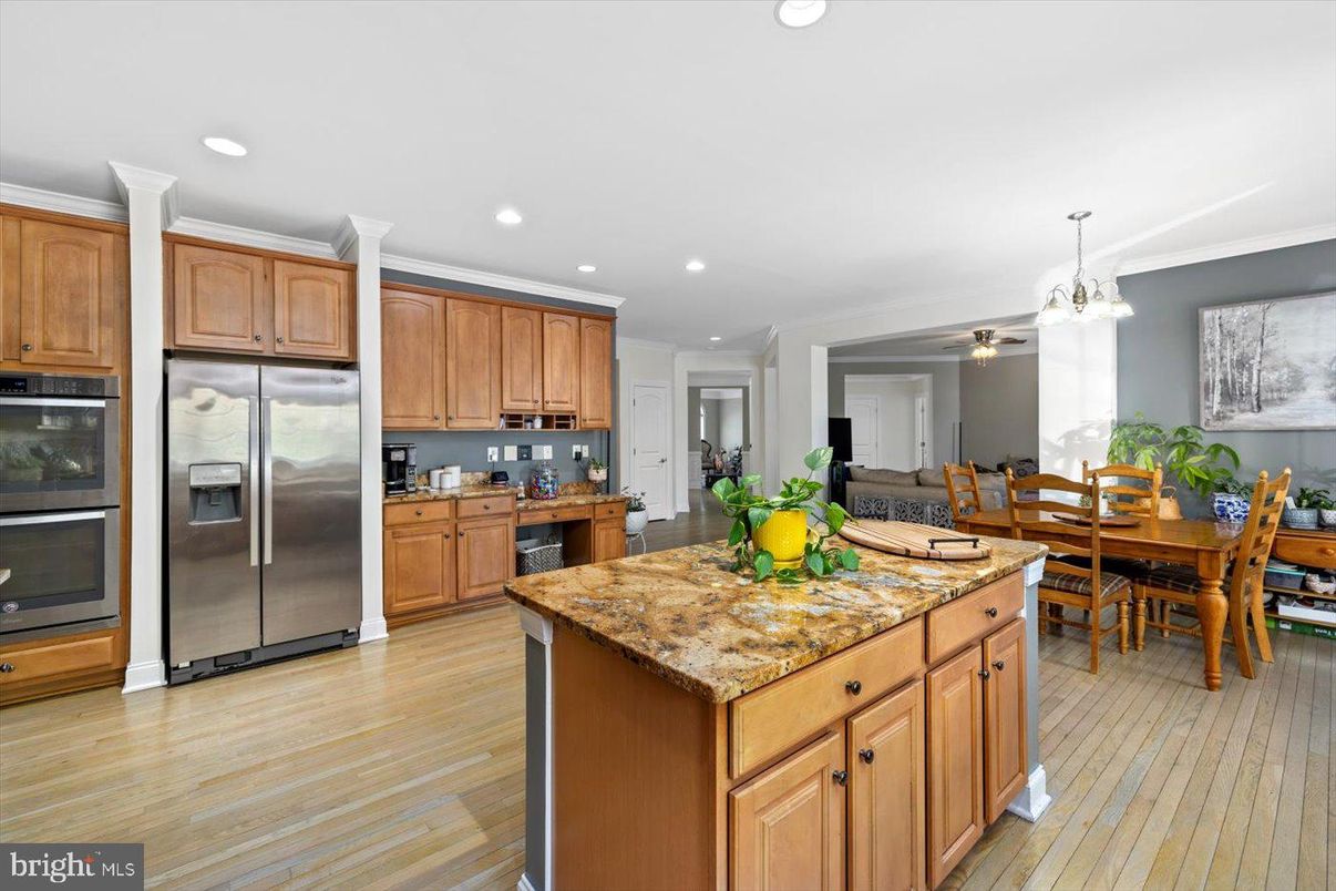 Dining room, Interior, Kitchen, Pendant Lights, Recessed Lighting, Stainless Steel Appliances, Wood Texture Flooring