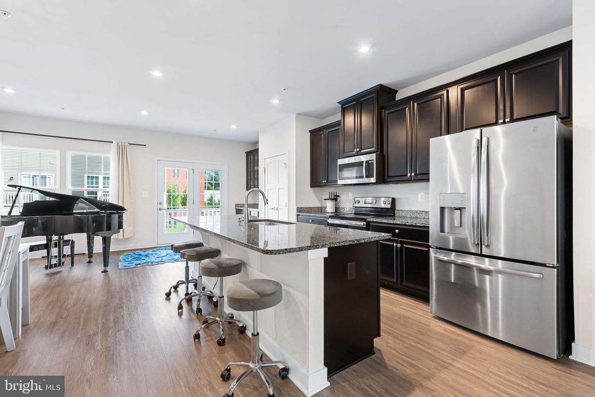 Interior, Kitchen, Piano, Recessed Lighting, Stainless Steel Appliances, Wood Texture Flooring