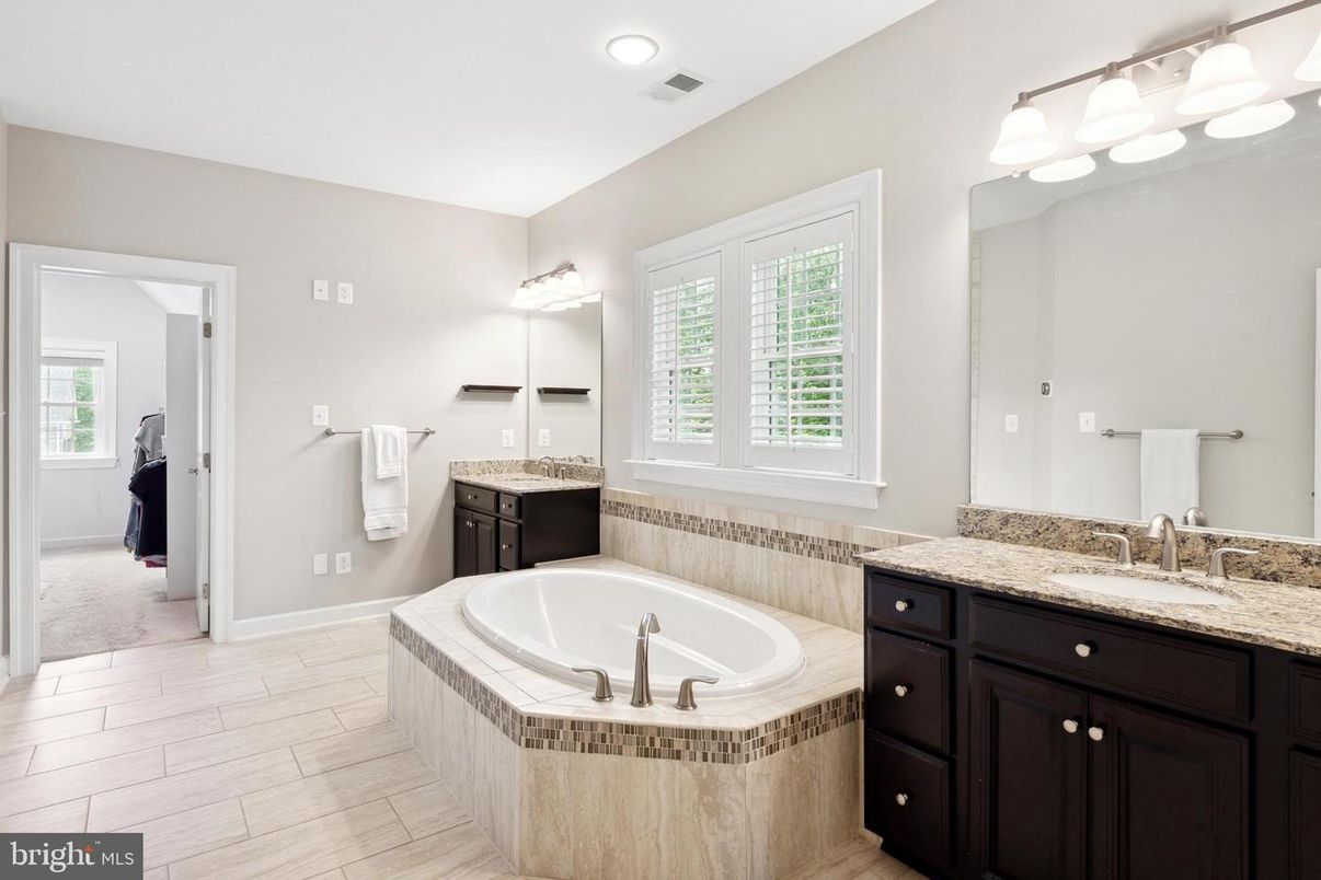 Bathroom, Dual Sink Vanities, Interior, Recessed Lighting, Wood Texture Flooring