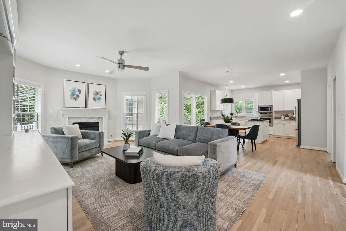 Dining room, Fireplace, Interior, Kitchen, Living room, Pendant Lights, Recessed Lighting, Stainless Steel Appliances, Wood Texture Flooring