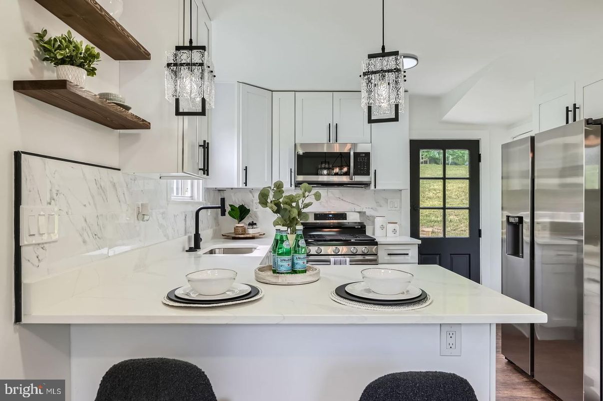 Interior, Kitchen, Marble Walls, Pendant Lights, Stainless Steel Appliances, Wood Texture Flooring