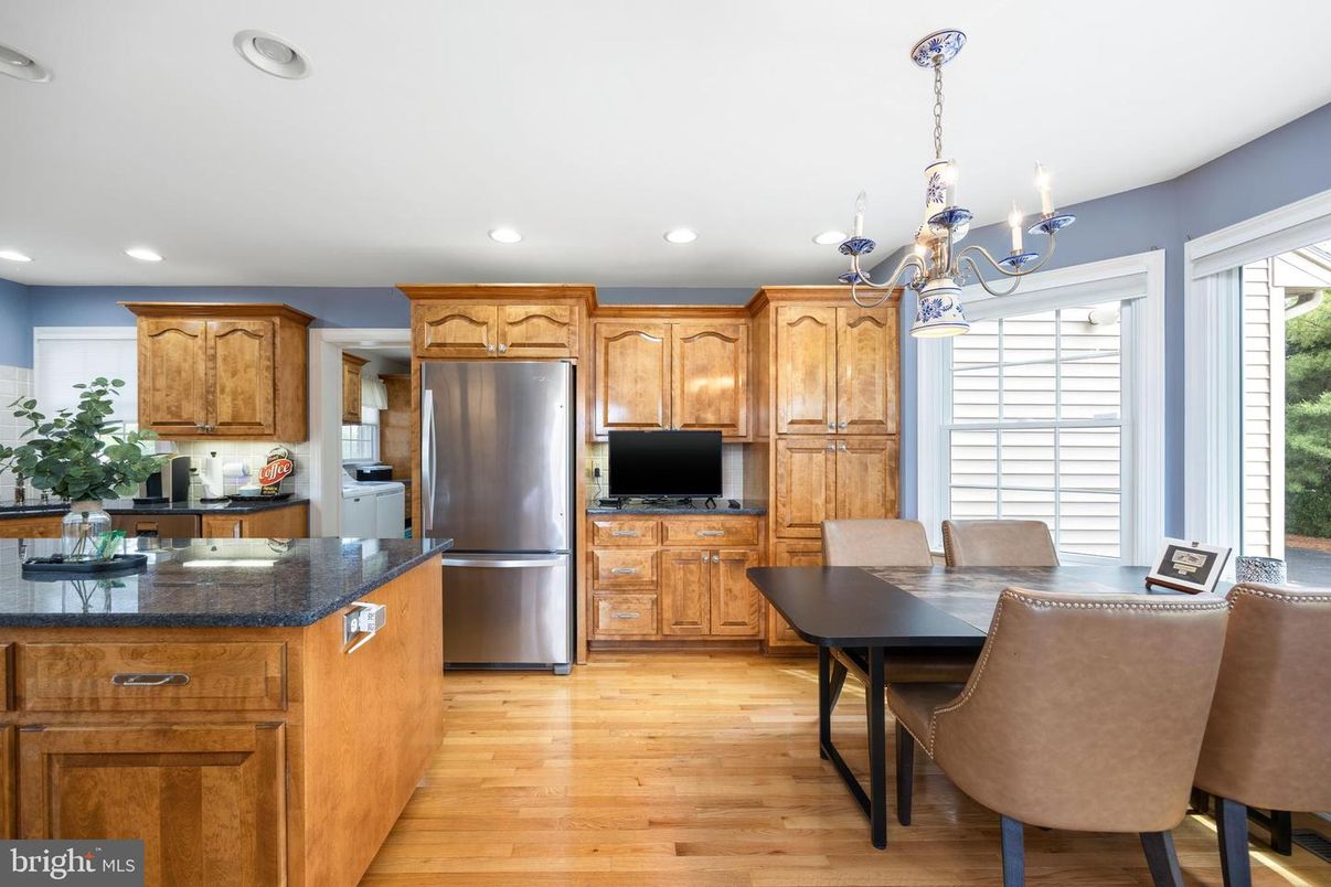 Chandelier, Dining room, Interior, Kitchen, Recessed Lighting, Stainless Steel Appliances, Wood Texture Flooring