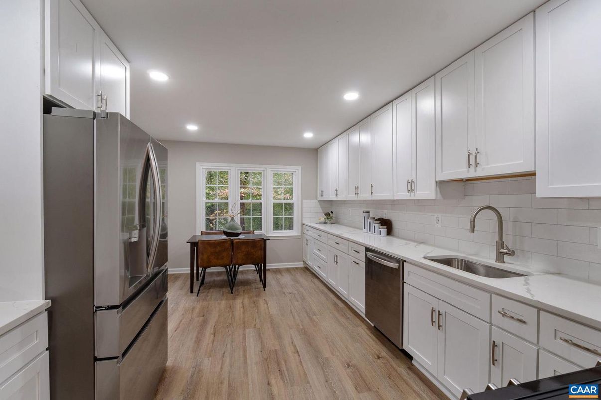 Dining room, Interior, Kitchen, Recessed Lighting, Stainless Steel Appliances, Wood Texture Flooring