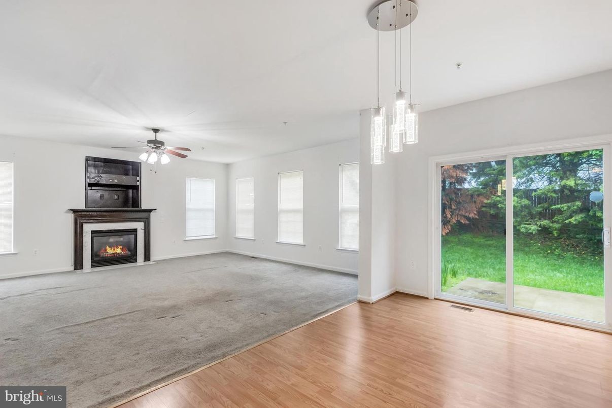 Empty room, Fireplace, Interior, Pendant Lights, Wood Texture Flooring