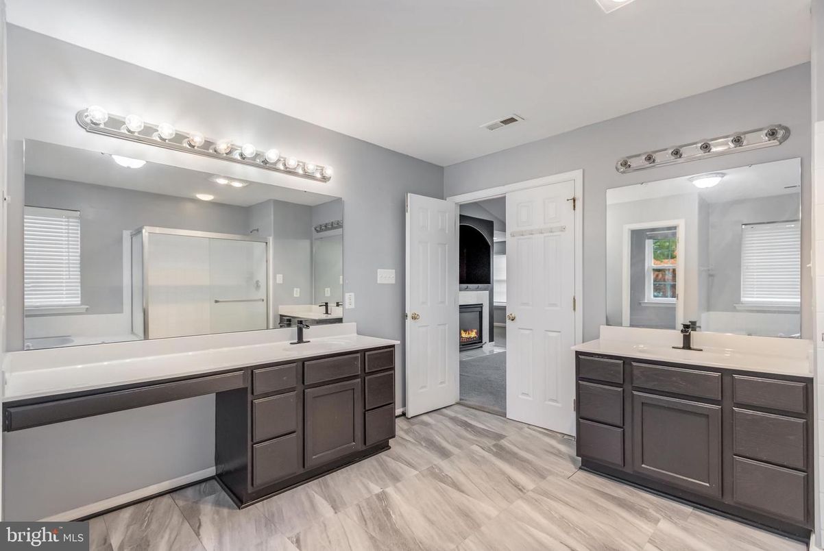 Bathroom, Dual Sink Vanities, Fireplace, Interior, Wood Texture Flooring