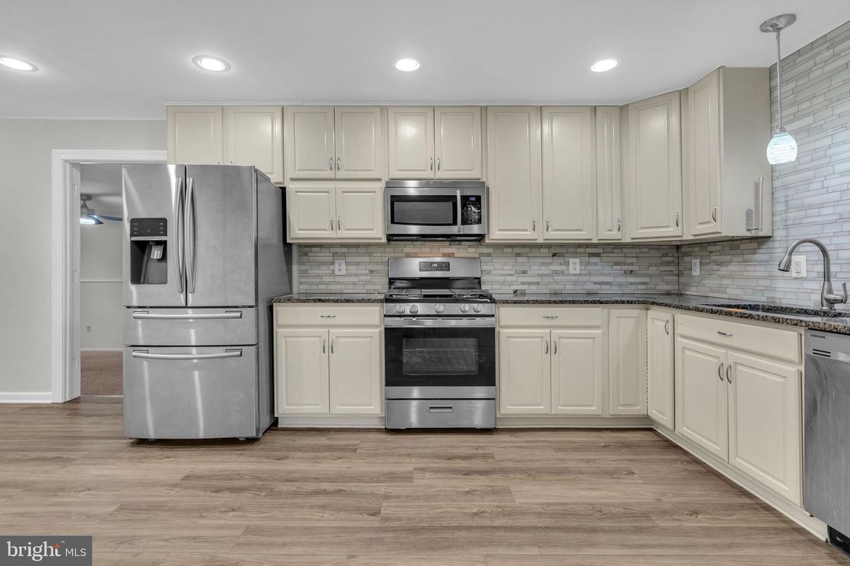 Interior, Kitchen, Pendant Lights, Recessed Lighting, Stainless Steel Appliances, Wood Texture Flooring