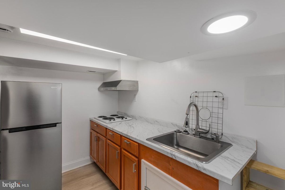 Interior, Kitchen, Marble Walls, Recessed Lighting, Wood Texture Flooring