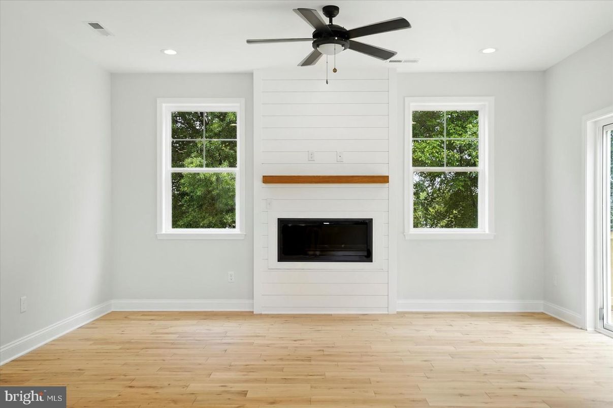 Empty room, Fireplace, Interior, Recessed Lighting, Wood Texture Flooring