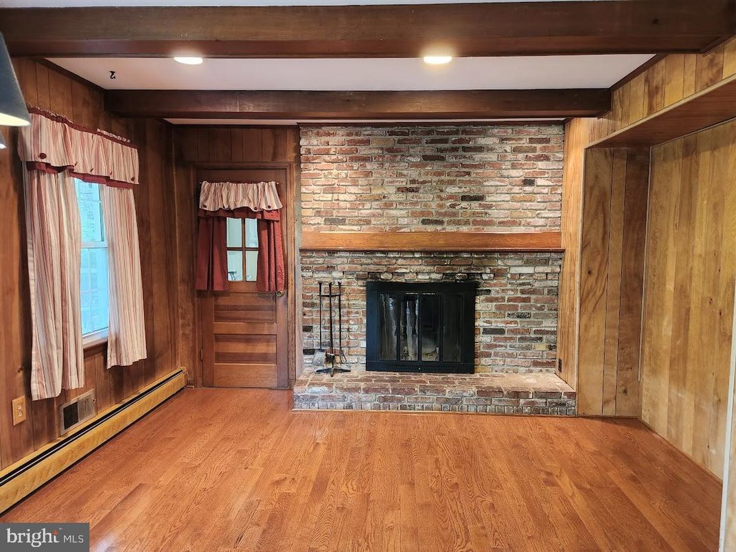 Empty room, Fireplace, Interior, Recessed Lighting, Stone Walls, Wood Texture Flooring, Wooden Walls