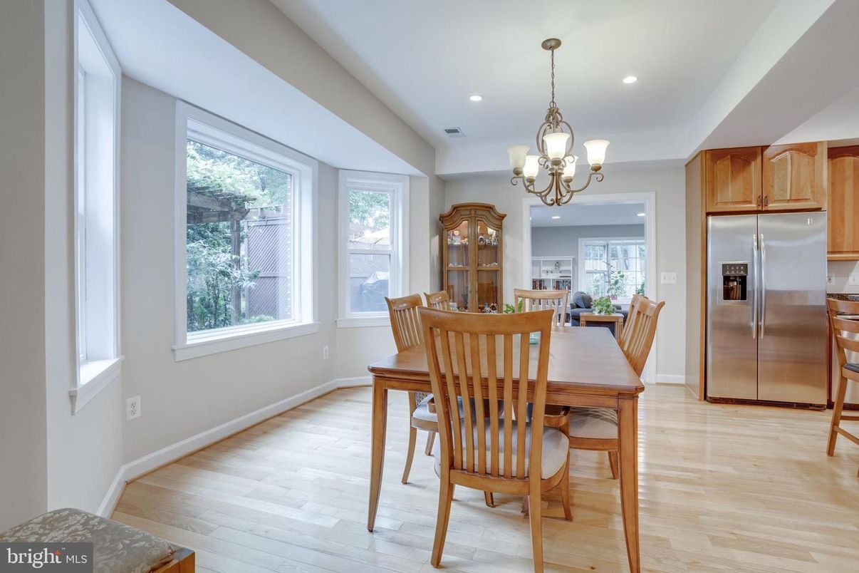 Chandelier, Dining room, Interior, Kitchen, Recessed Lighting, Stainless Steel Appliances, Wood Texture Flooring