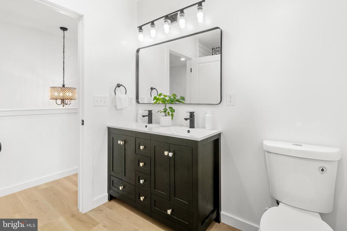 Bathroom, Dual Sink Vanities, Interior, Pendant Lights, Wood Texture Flooring